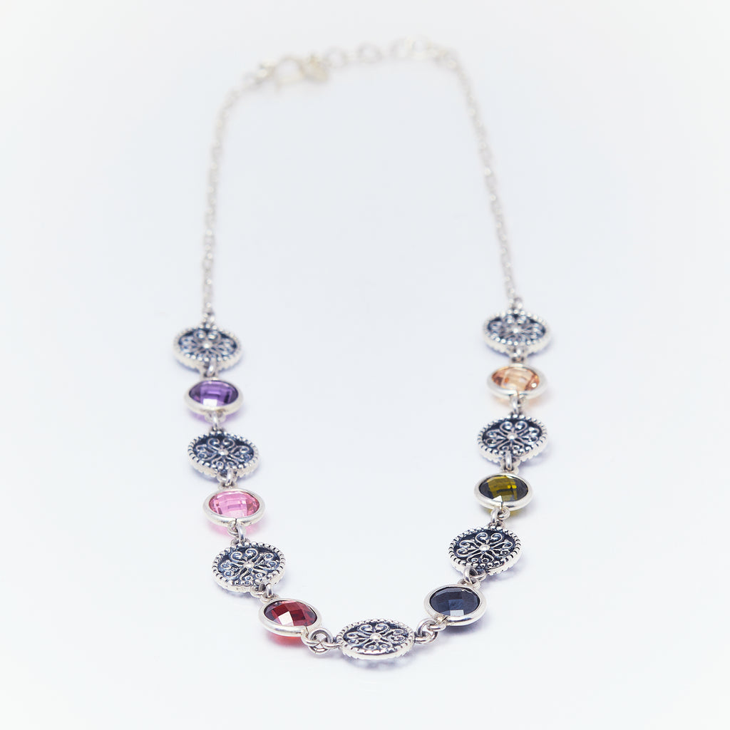 Andrea amethyst and rose garnet jewelry set featuring elegant earrings with shimmering cubic zirconia accents.