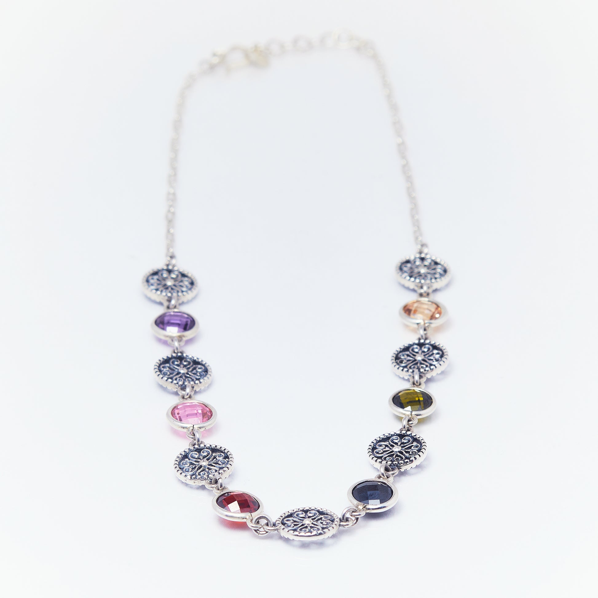 Andrea amethyst and rose garnet jewelry set featuring elegant earrings with shimmering cubic zirconia accents.